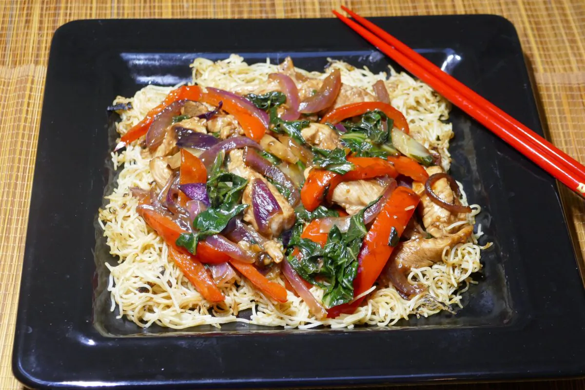 Honey Stir-Fried Chicken and Wok-Flavored Noodles. (Linda Gassenheimer/TNS)