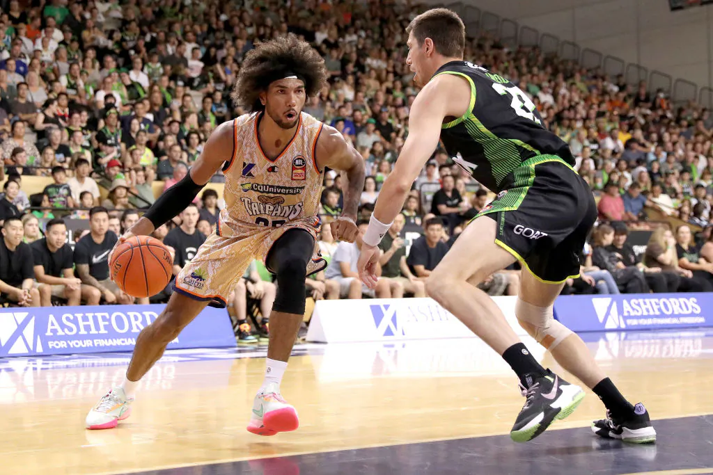 Keanu Pinder of the Taipans in action against Dane Pineau of the Phoenix during the round 17 NBL match between South East Melbourne Phoenix and Cairns Taipans at State Basketball Centre in Melbourne, Australia on Jan. 25, 2023. (Kelly Defina/Getty Images)