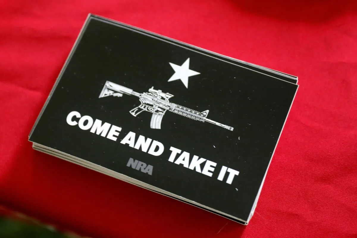 An NRA sticker is on display as people gather for the 12th annual Second Amendment March sponsored by Michigan Open Carry, Inc and Second Amendment March outside of the Michigan State Capitol in Lansing, Mich., on Sept. 23, 2021. (Jeff Kowalsky/AFP via Getty Images)