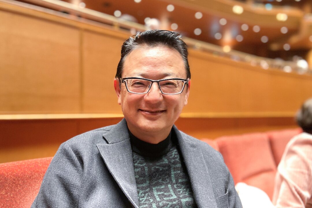 Mr. Umemura Takeshi, the president of a foreign candidates’ recruiting firm, attends Shen Yun Performing Arts at the Aichi Prefectural Art Theater in Nagoya, Japan, on Jan. 27, 2023. (Wang Wenliang/The Epoch Times)