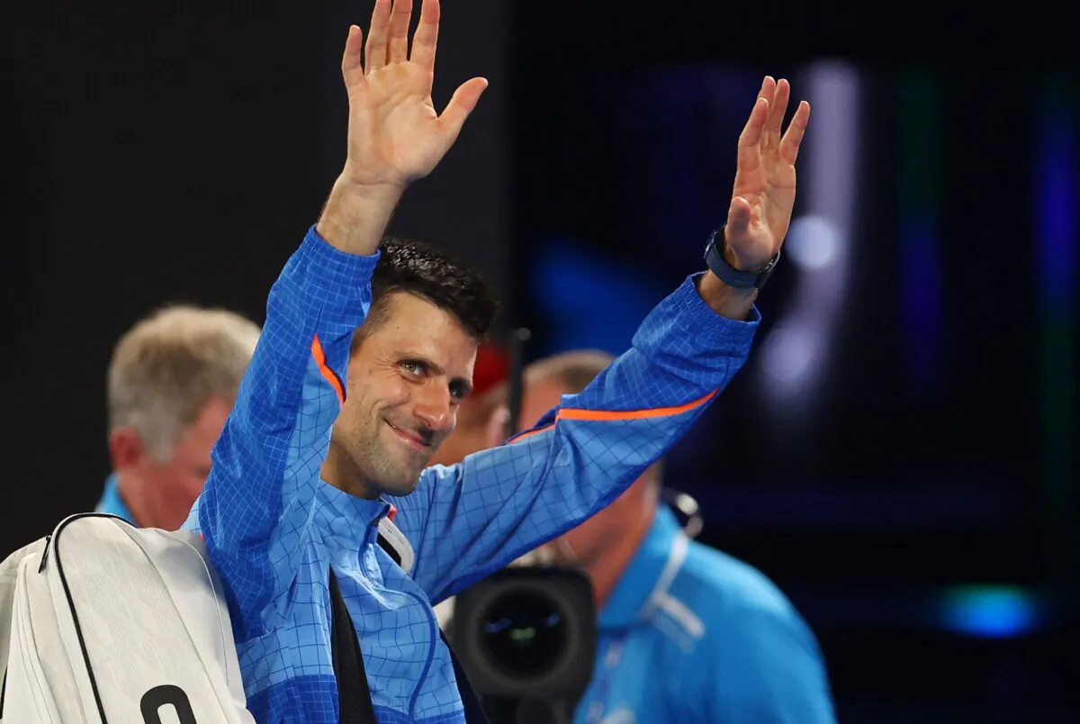 Serbia’s Novak Djokovic celebrates winning his semi-final match against Tommy Paul of the U.S. during the Australian Open, in Melbourne Park, Melbourne, Australia, on Jan. 27, 2023. (Hannah Mckay/Reuters)