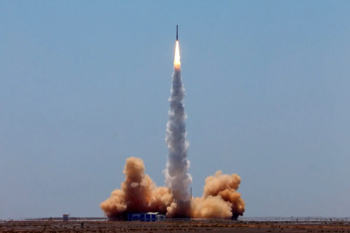 A rocket carrying two satellites lifts off from the Jiuquan Satellite Launch Centre in Gansu Province, northwest China, on July 25, 2019. (STR/AFP via Getty Images)