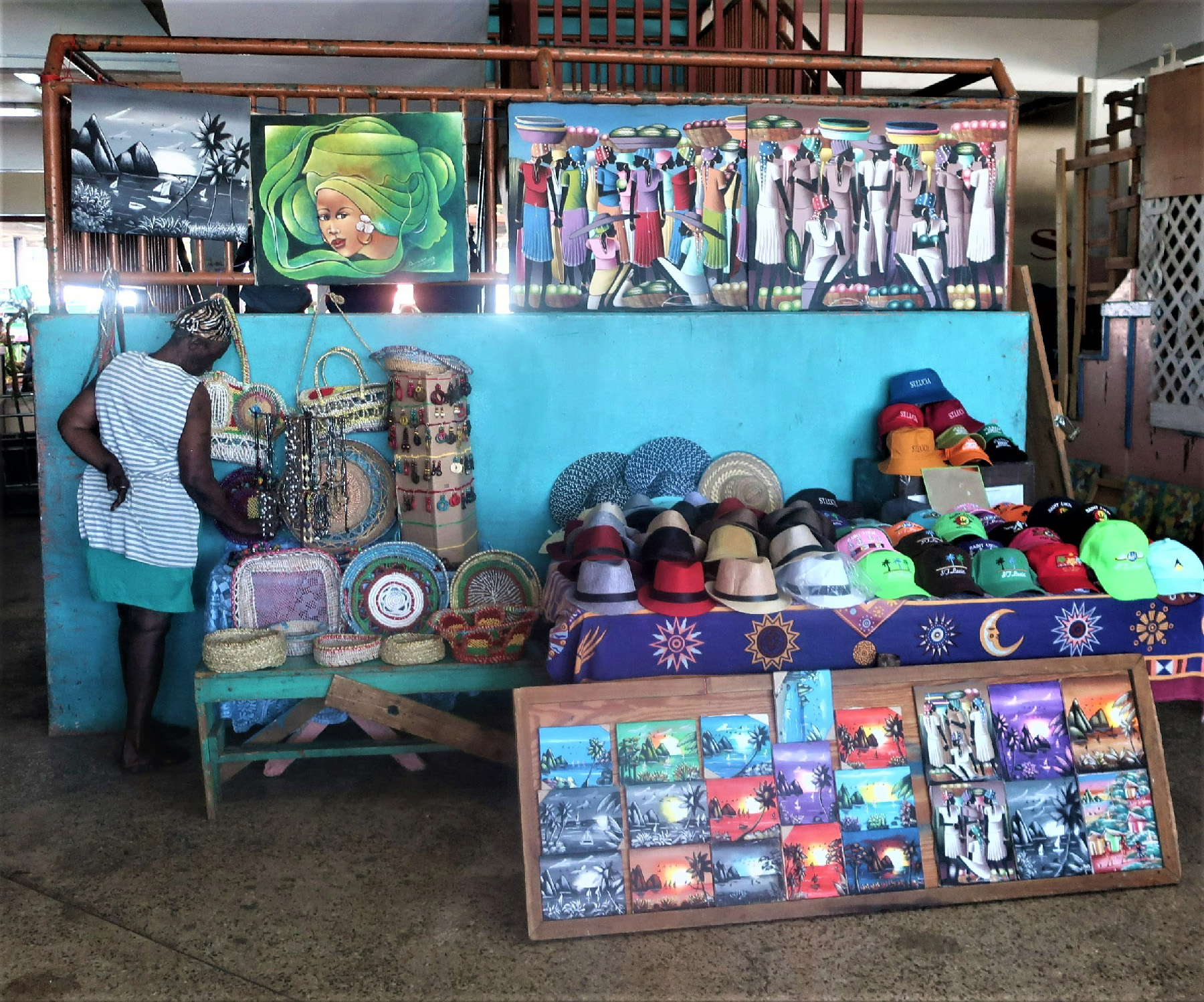 A shopper examines merchandise at the Castries Market in St. Lucia.