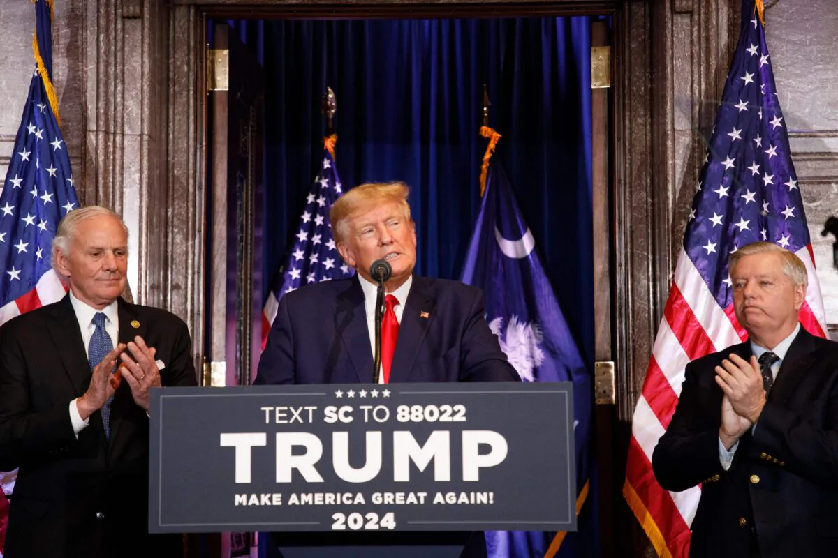 Former President Donald Trump, joined by Sen. Lindsay Graham (R-S.C.) (R), and South Carolina Gov. Henry McMaster (L), speaks at a 2024 election campaign event in Columbia, S.C., on Jan. 28, 2023. (Logan Cyrus/AFP via Getty Images)