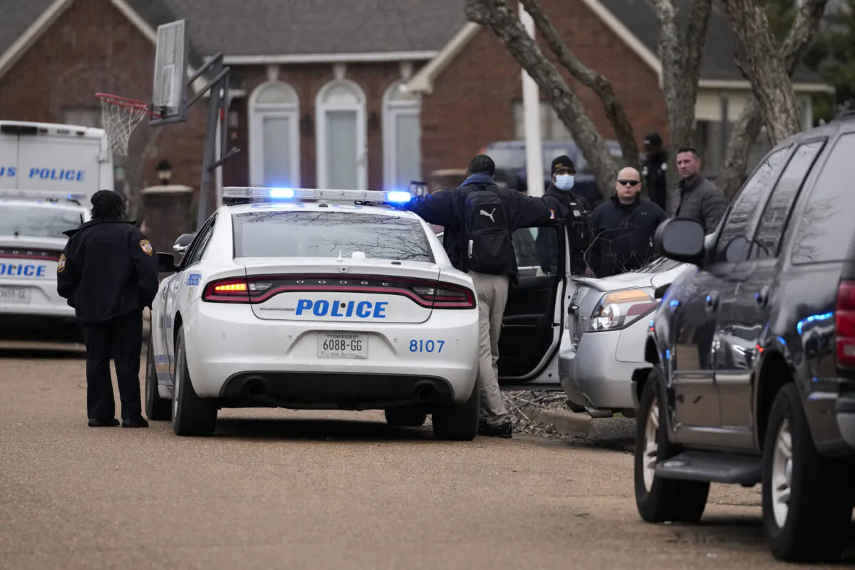 Members of the Memphis Police Department work a crime scene in Memphis, Tenn., on Jan. 24, 2023. (Gerald Herbert/AP Photo)