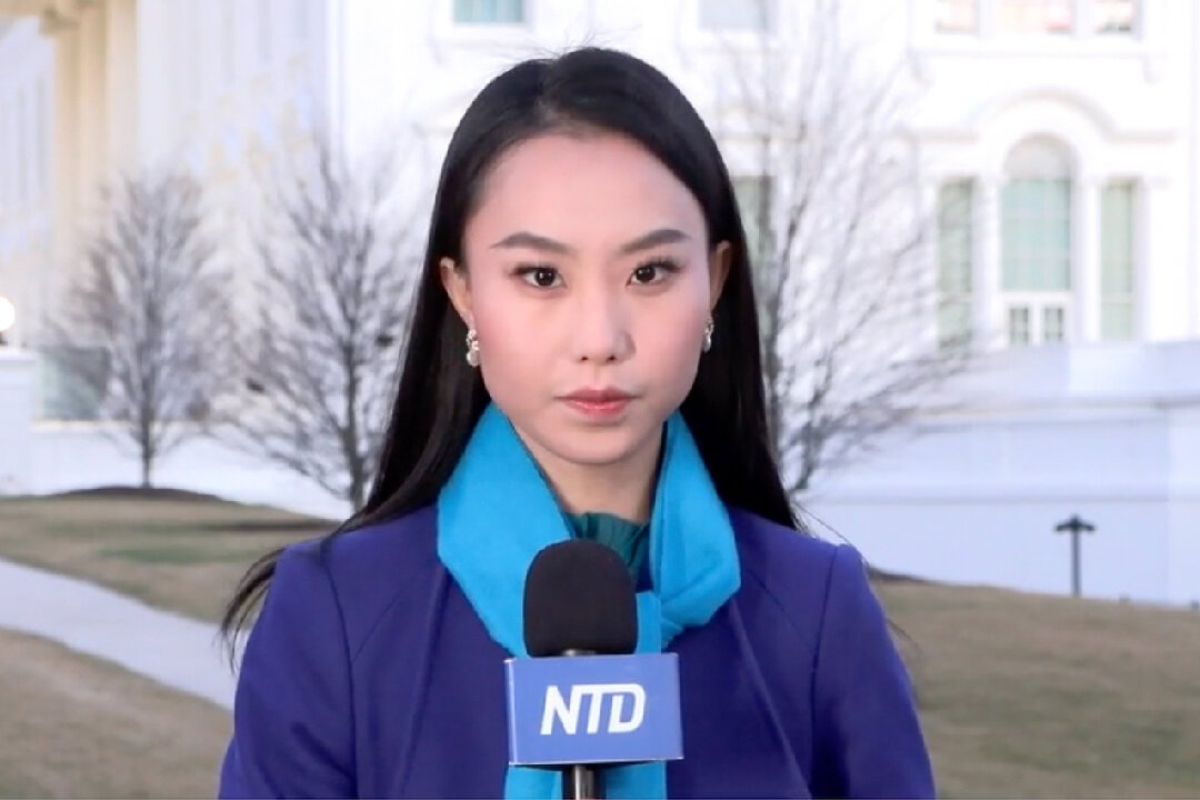 Iris Tao, a reporter for The Epoch Times' sister media NTD, reports from the White House on Jan. 27, 2023. (NTD/Screenshot via The Epoch Times) 