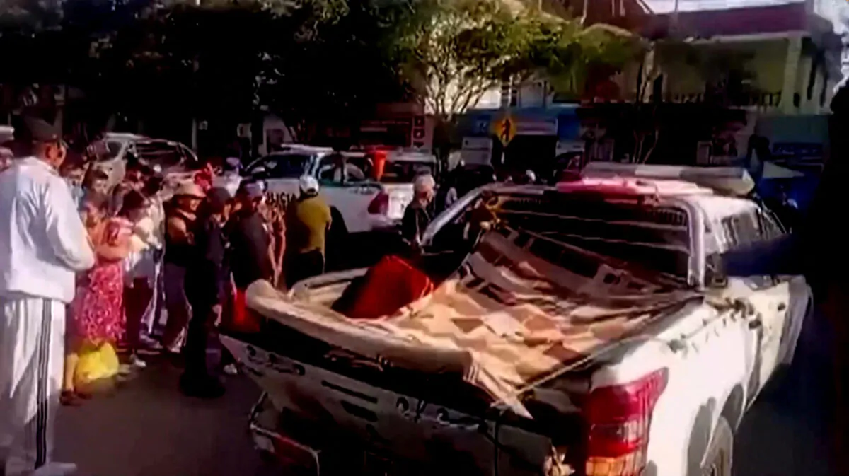 Bodies of victims are transported on the back of a pick-up truck after a bus carrying 60 passengers plunged off a cliff in the district of El Alto, Peru, on Jan. 28, 2023. (Piura Government/Handout via Reuters)