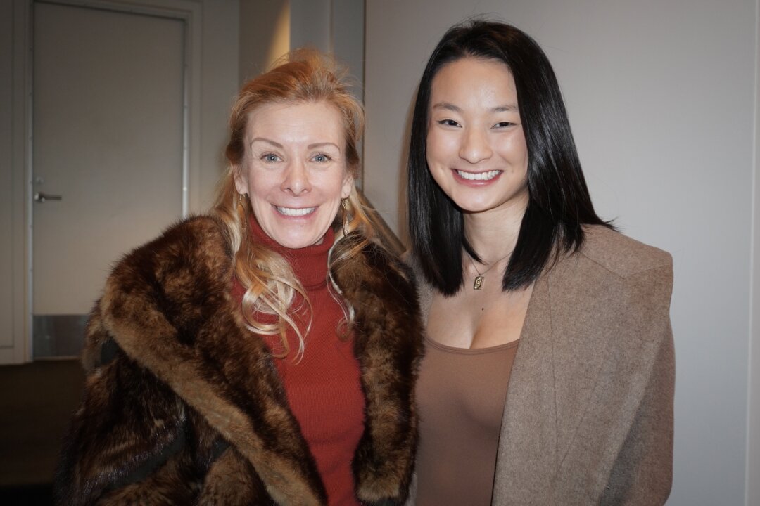 College professor Barbara Craig (L) and her adopted daughter attended Shen Yun Performing Arts at the Muriel Kauffman Theatre, in the Kauffman Center for the Performing Arts, Kansas, City on Jan. 29, 2023. (Sherry Dong/The Epoch Times)