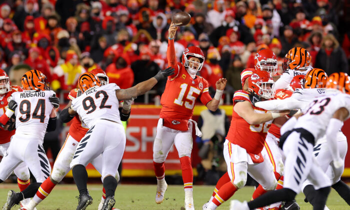 Patrick Mahomes (15) of the Kansas City Chiefs throws a pass against the Cincinnati Bengals during the fourth quarter in the AFC Championship Game at GEHA Field at Arrowhead Stadium in Kansas City on Jan. 29, 2023. (Kevin C. Cox/Getty Images)