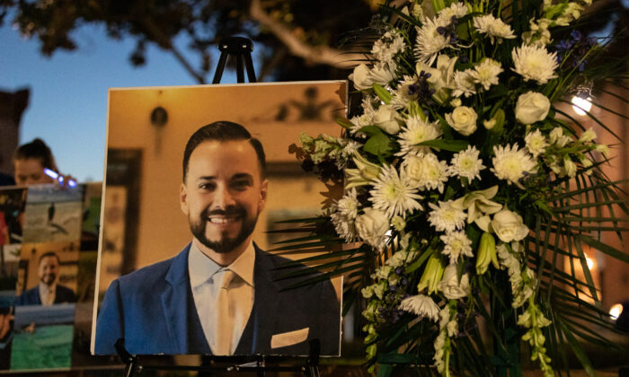 Hundreds attend a candlelight vigil in memory of Orange County Deputy Public Defender Elliot Blair in Orange, Calif., on Jan. 26, 2023. (John Fredricks/The Epoch Times)