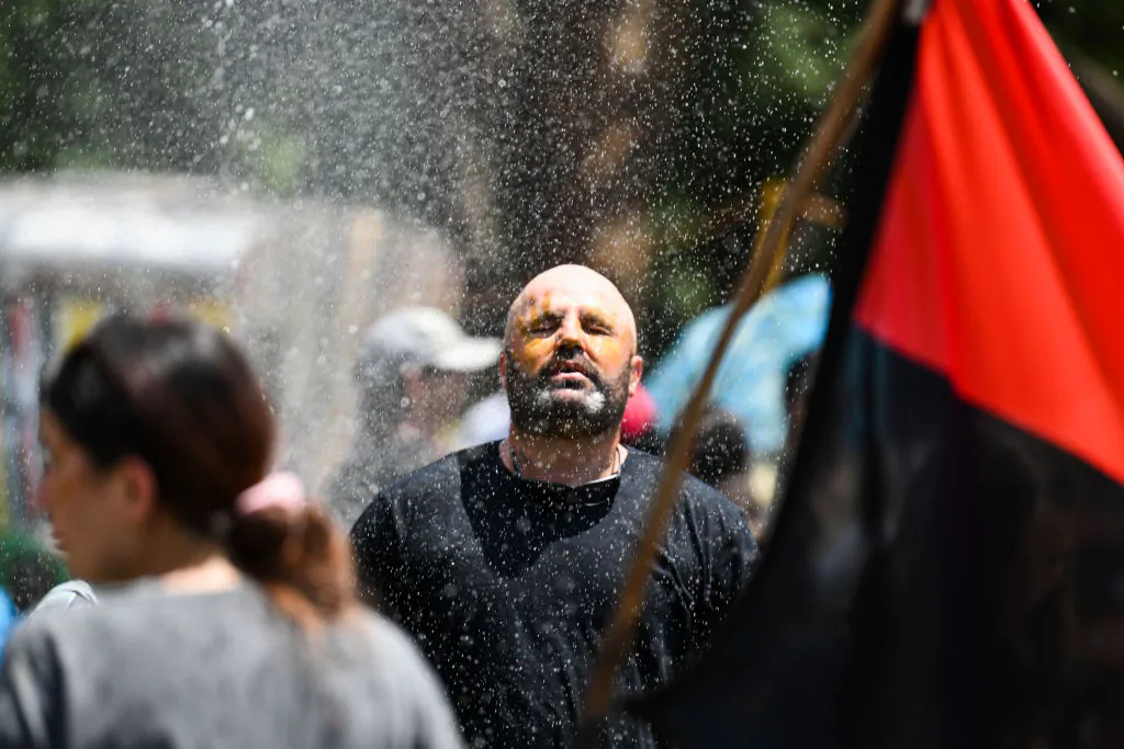 The Aboriginal Tent Embassy holds a family BBQ and entertainment in Canberra, Australia on Jan. 26, 2023. (Martin Ollman/Getty Images)
