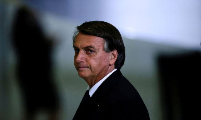 Brazil's President Jair Bolsonaro looks on after a ceremony about the National Policy for Education at the Planalto Palace in Brasilia, Brazil, on June 20, 2022. (Ueslei Marcelino/Reuters)