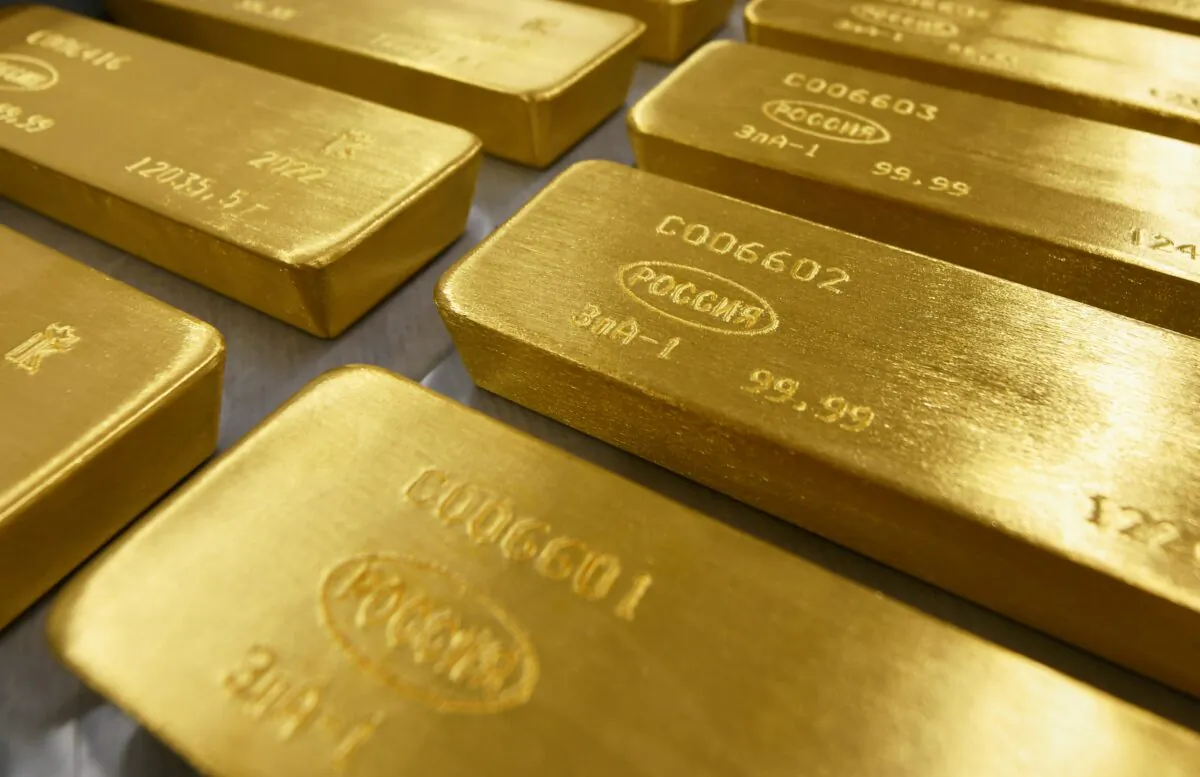 Marked ingots of 99.99 percent pure gold are placed in a cart at the Krastsvetmet non-ferrous metals plant in the Siberian city of Krasnoyarsk, Russia, on March 10, 2022. (Alexander Manzyuk/Reuters)