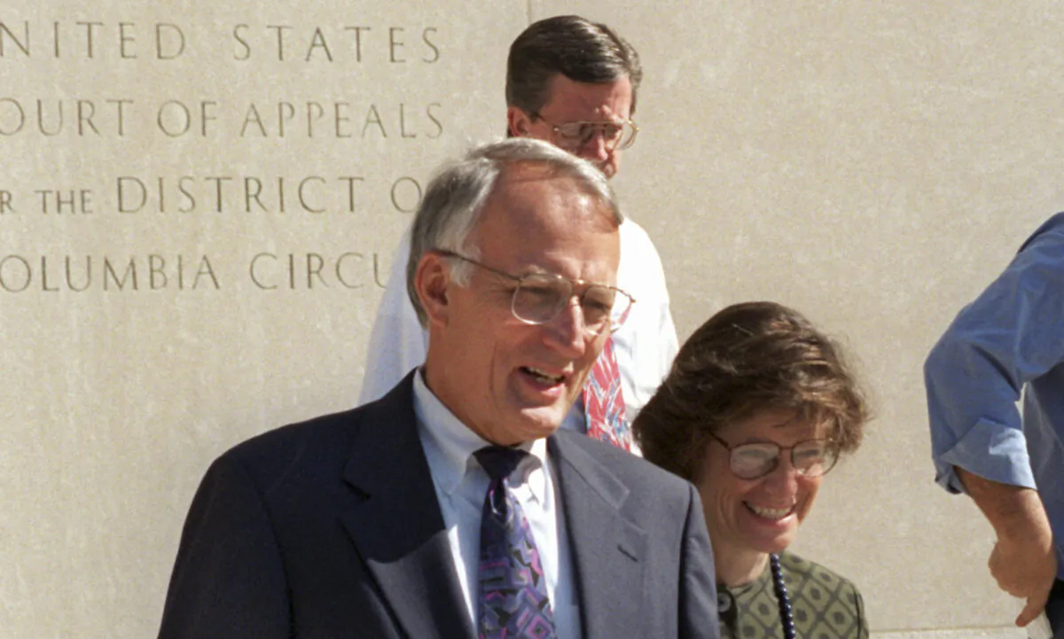 Former Minnesota Sen. David Durenberger and fiancee Susan Foote leave federal court in Washington on Aug. 22, 1995, after Durenberger pleaded guilty to five misdemeanor charges involving the abuse of his congressional expense account. (Dennis Cook/AP Photo)