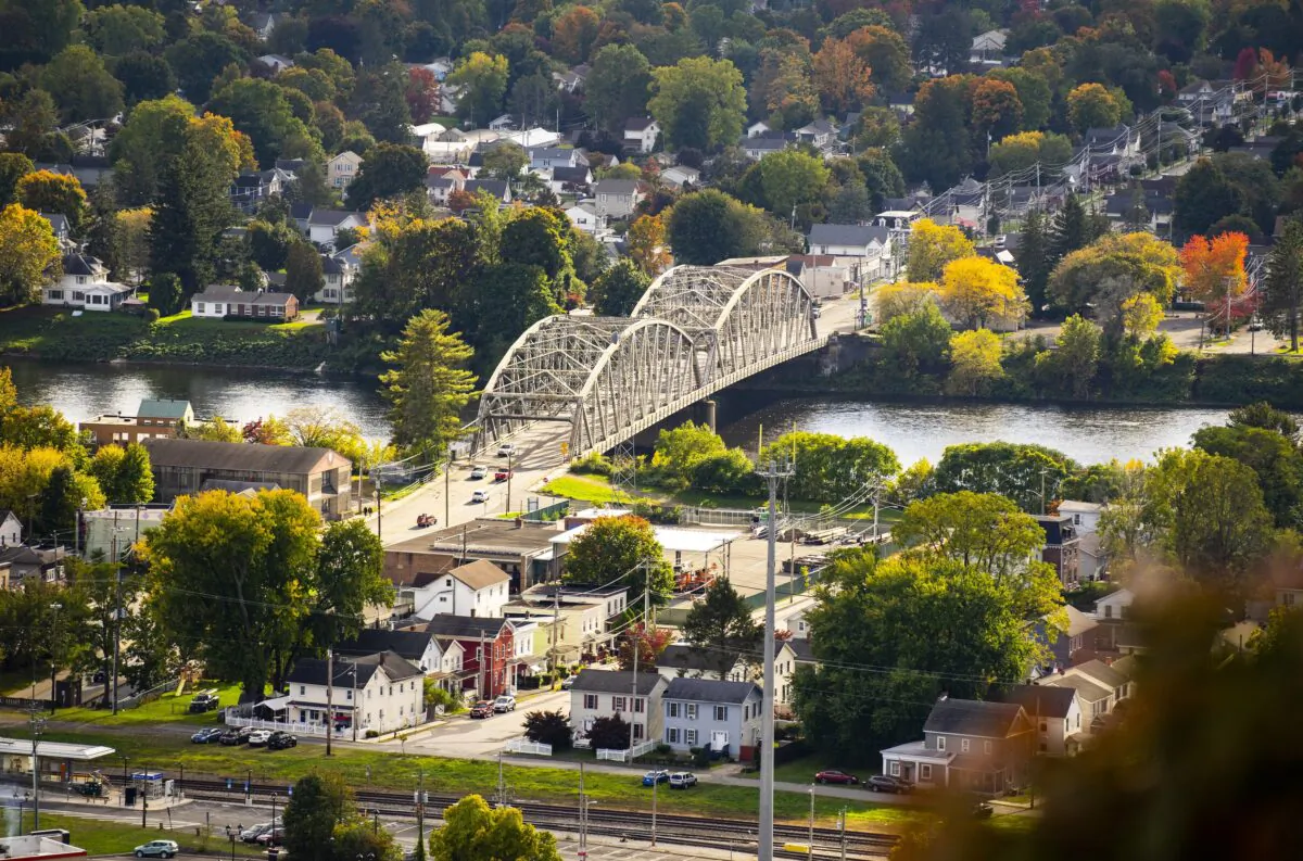 The view of downtown Port Jervis at Elks-Brox Memorial Park in Port Jervis, N.Y., on Oct. 9, 2022. The bridge here is Mid-Delaware Bridge, which connects Pennsylvania and New York states. (Chung I Ho/The Epoch Times)