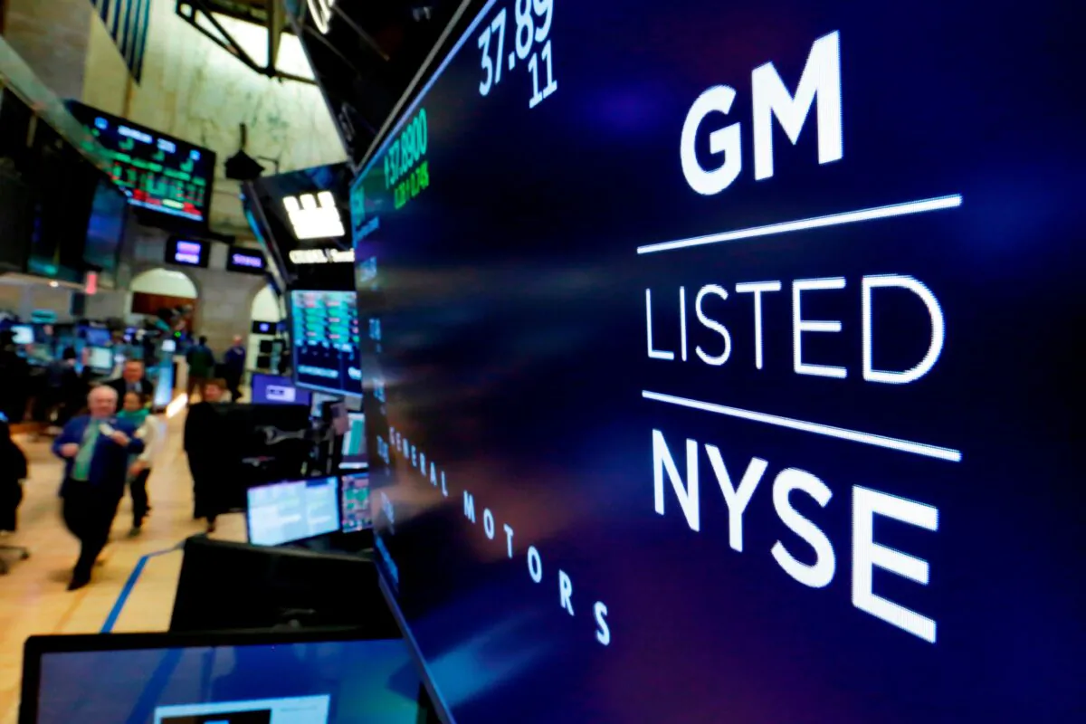 The logo for General Motors appears above a trading post on the floor of the New York Stock Exchange on Jan. 31, 2023. (Richard Drew/AP Photo)