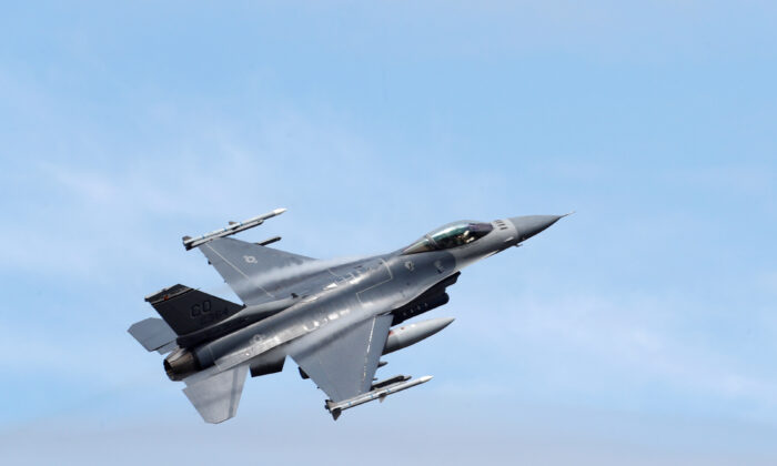 U.S. Air Force F-16 Fighting Falcon from the 140th Wing of the Colorado Air National Guard during NATO exercise Saber Strike flies over Amari military air base, Estonia, on June 12, 2018. (Ints Kalnins/Reuters)