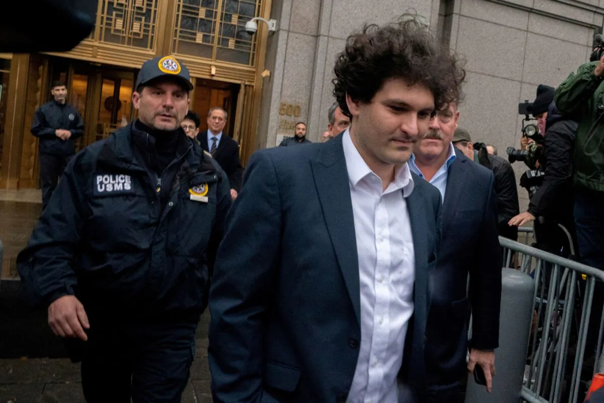 Former FTX Chief Executive Sam Bankman-Fried, who faces fraud charges over the collapse of the bankrupt FTX cryptocurrency exchange, departs from a federal court hearing in New York on Jan. 3, 2023. (David Dee Delgado/Reuters)