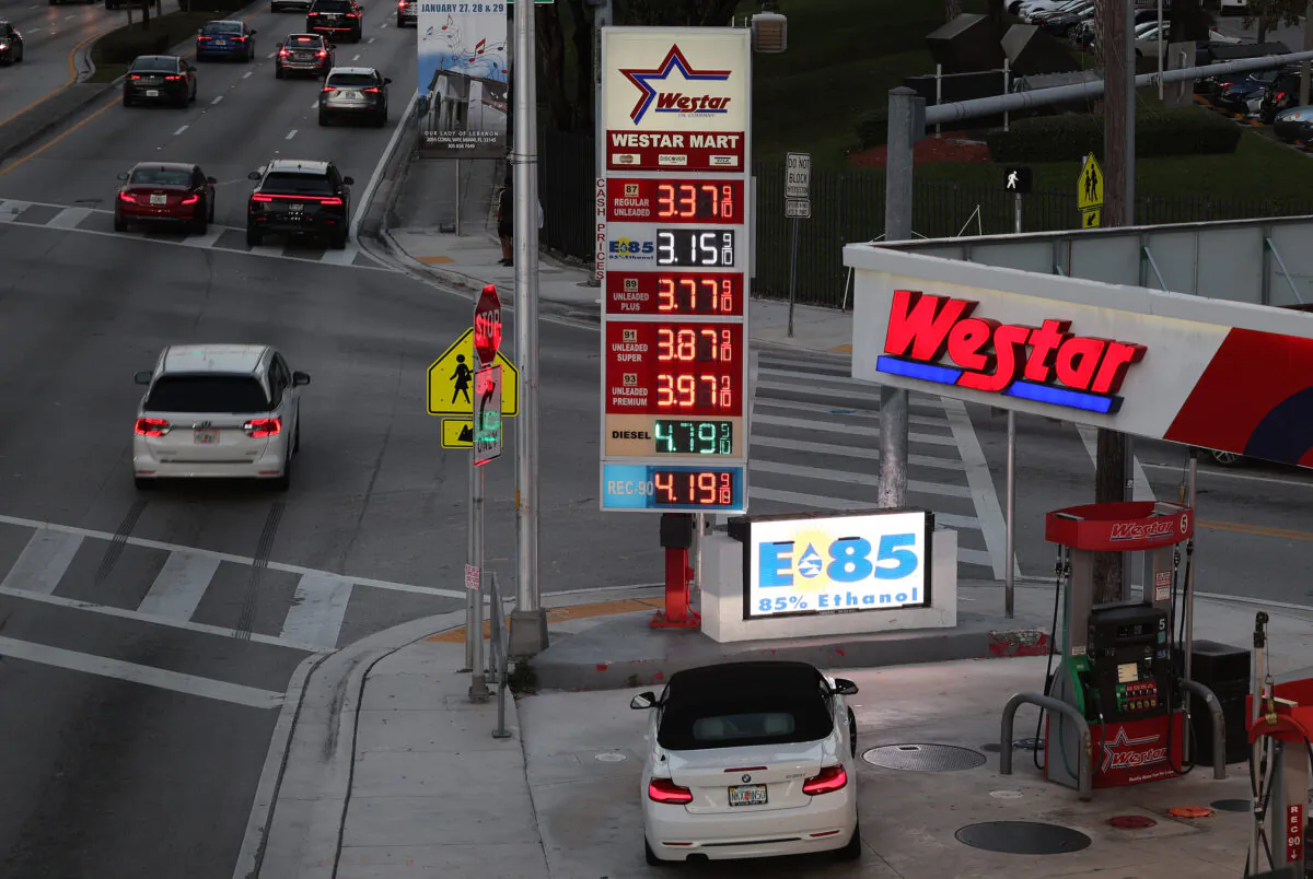 The price of gas is displayed on a sign at a gas station in Miami on Jan. 23, 2023. (Joe Raedle/Getty Images)