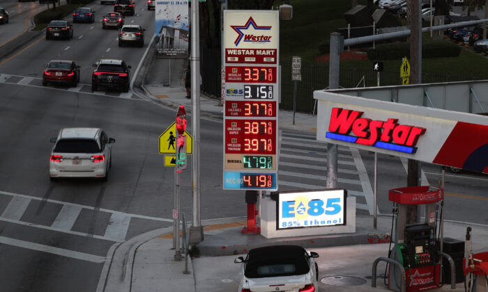 The price of gas is displayed on a sign at a gas station in Miami on Jan. 23, 2023. (Joe Raedle/Getty Images)