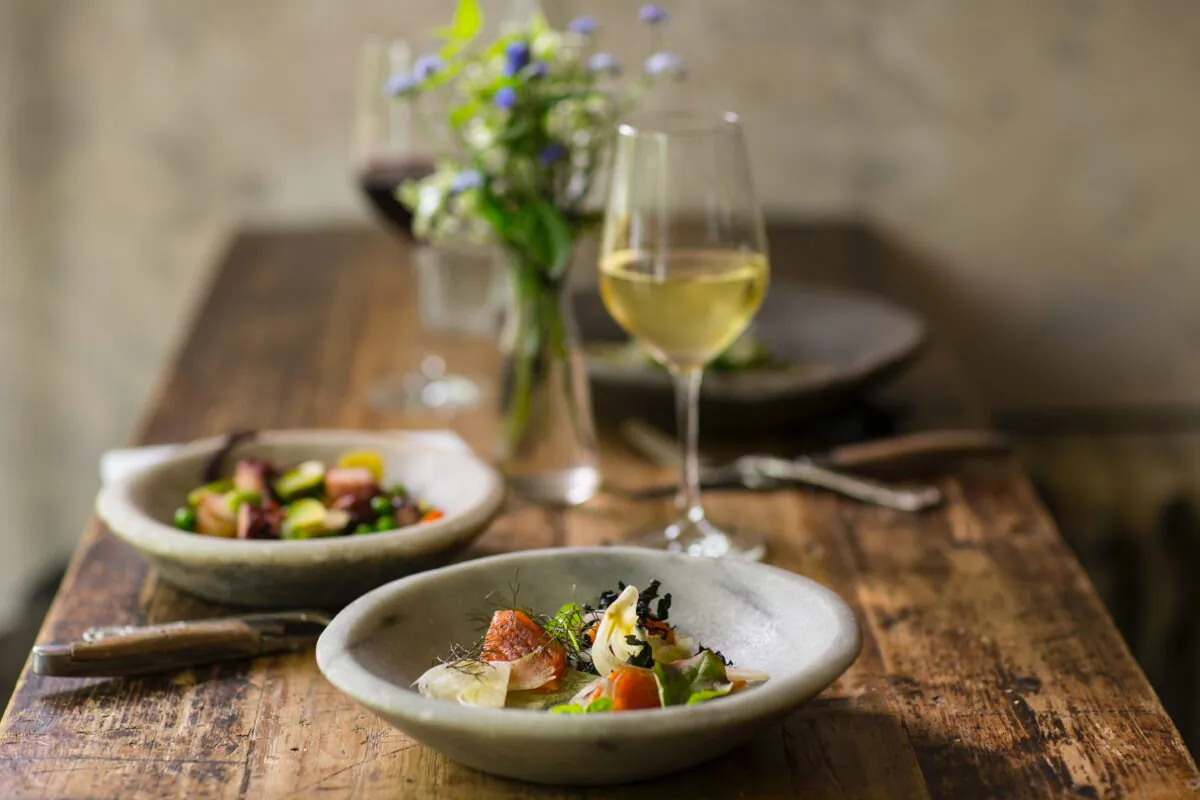 For more moderate wines to drink with a meal, try rieslings and silvaners from Germany, and vinho verde from Portugal. (Stefan Johnson/Unsplash)