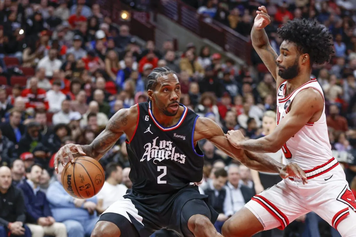 LA Clippers forward Kawhi Leonard (2) drives to the basket against Chicago Bulls guard Coby White (0) during the first half at United Center in Chicago on Jan. 31, 2023. (Kamil Krzaczynski/USA TODAY Sports via Field Level Media)