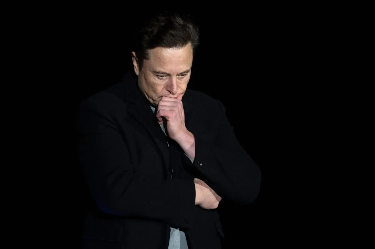 Elon Musk pauses as he speaks during a press conference at SpaceX's Starbase facility near Boca Chica Village, Texas, on Feb. 10, 2022. (Jim Watson/AFP via Getty Images)