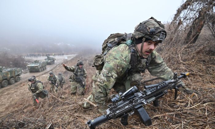 U.S. soldiers participate in a joint military drill between the U.S. 2nd Infantry Division Stryker Battalion and the ROK 25th Infantry Division Army Tiger Demonstration Brigade at a training field in Paju, South Korea on Jan. 13, 2023. (Jung Yeon-je/AFP via Getty Images)