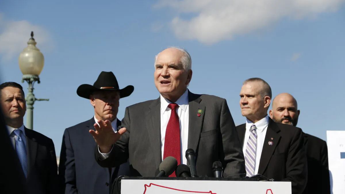 Rep. Mike Kelly (R-Pa.) and other House Republicans speak at a conference launching the Northern Border Security Caucus at the House Triangle in Washington on Feb. 28, 2023. (Madalina Vasiliu/The Epoch Times)