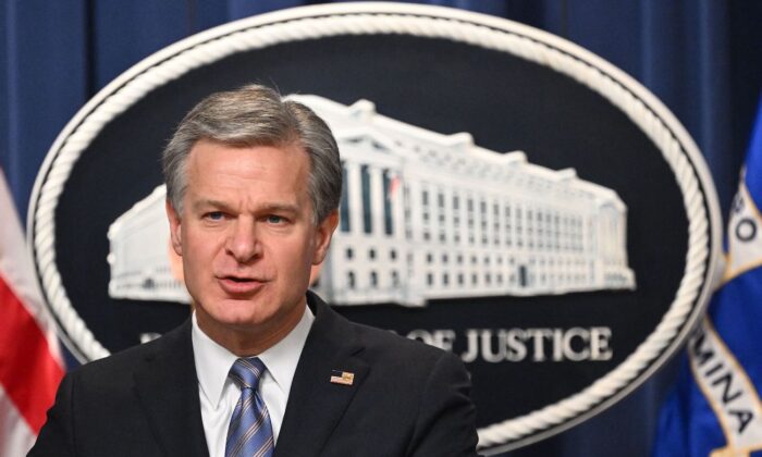 FBI Director Christopher Wray speaks during a press conference to announce an international ransomware enforcement action, at the Justice Department in Washington, on Jan. 26, 2023. (Mandel Ngan/AFP via Getty Images)