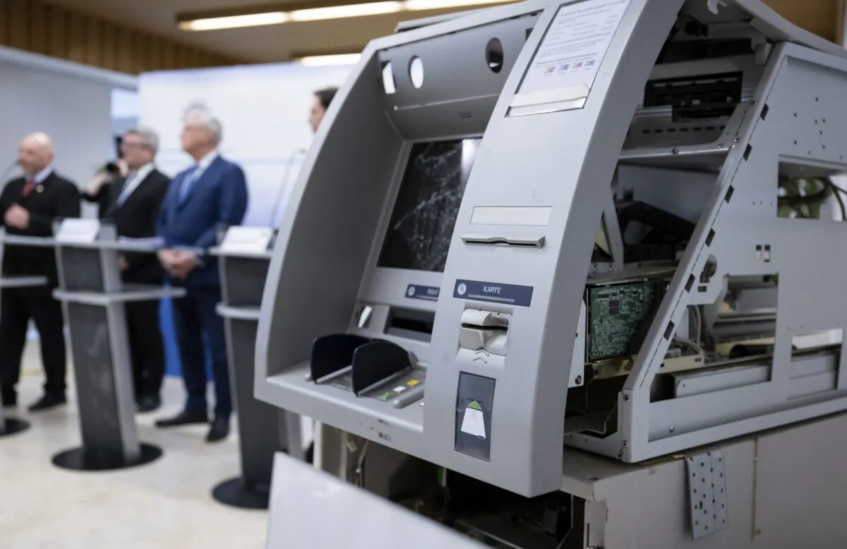 A blown-up ATM is displayed during a press conference at the State Criminal Police Office (LKA) in Munich on Feb. 2, 2023. (Sven Hoppe/dpa via AP)