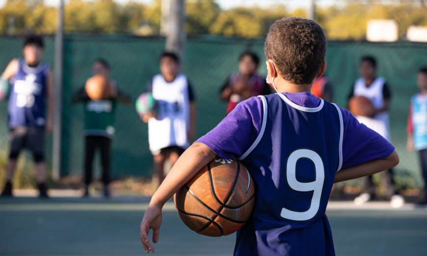 Children take part in a one hour basketball training session hosted by the YMCA of Orange County in Fullerton, Calif., on Feb. 1, 2023. (John Fredricks/The Epoch Times)