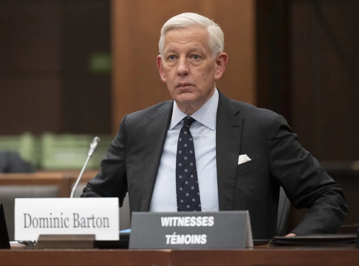 Dominic Barton waits to appear as a witness at the Standing Committee on Government Operations and Estimates in Ottawa on Feb. 1, 2023. The committee is looking into consulting contracts awarded to McKinsey and Co. (Adrian Wyld/The Canadian Press)