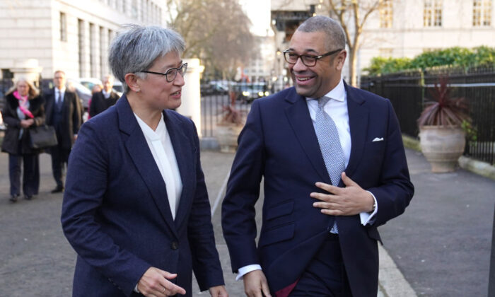 British Foreign Secretary James Cleverly welcomes Australian Foreign Minister Penny Wong ahead of a bilateral meeting at Carlton Gardens in London, England on Feb. 1, 2023. (Stefan Rousseau-WPA Pool/Getty Images)