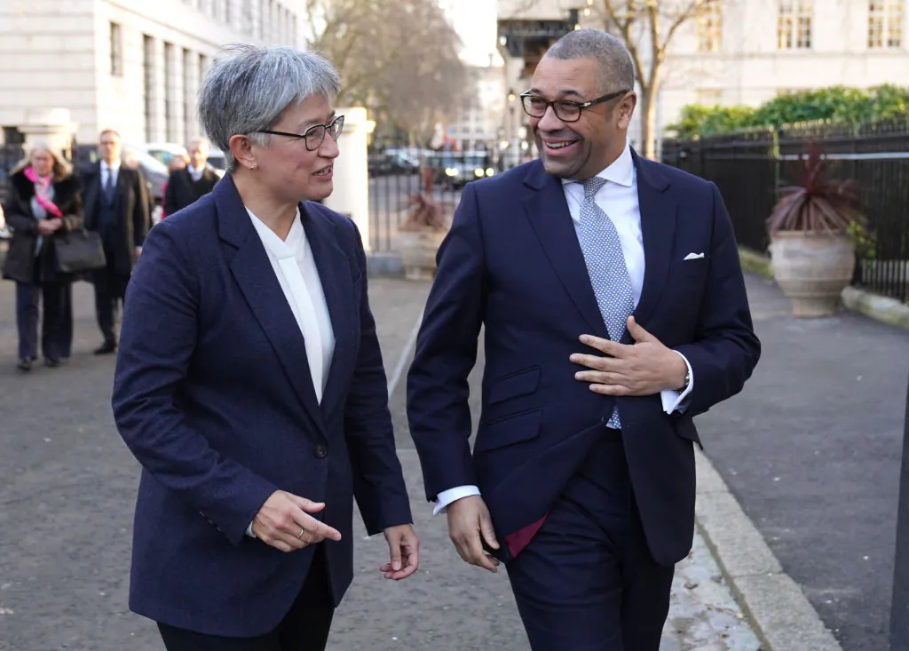 British Foreign Secretary James Cleverly welcomes Australian Foreign Minister Penny Wong ahead of a bilateral meeting at Carlton Gardens in London, England on Feb. 1, 2023. (Stefan Rousseau-WPA Pool/Getty Images)