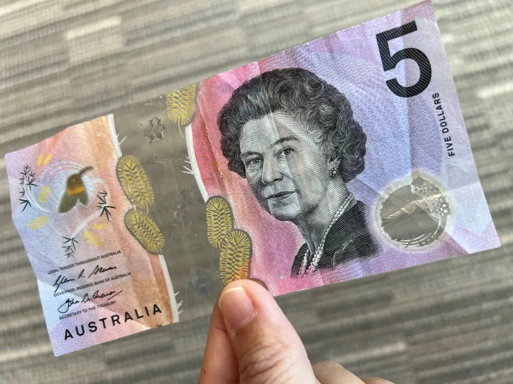This photo illustration taken in Hong Kong on Feb. 2, 2023 shows the Australian $5 banknote. (Mladen Antonov/AFP via Getty Images)