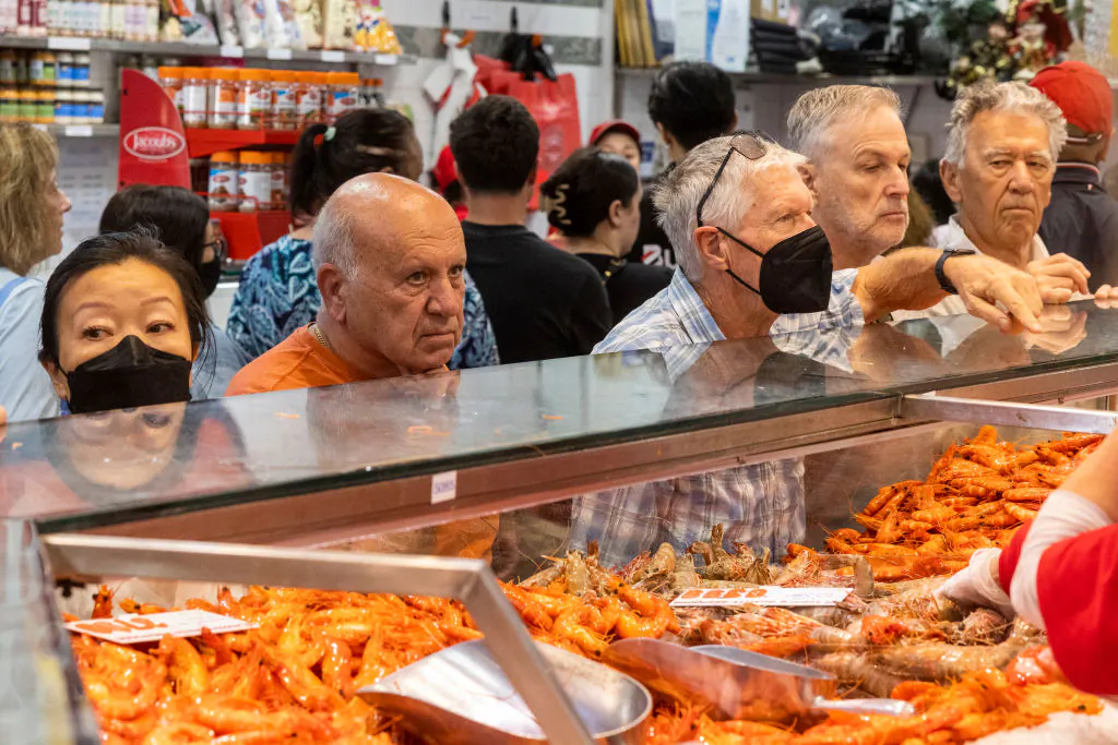 Customers line up to order seafood at Sydney Fish Market in Sydney, Australia,  on Dec. 24, 2022. (Jenny Evans/Getty Images)