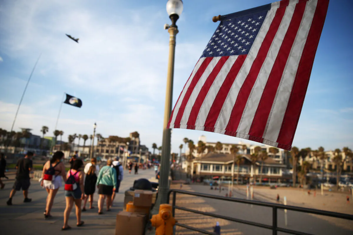An American flag is displayed on the Huntington Beach pier in Calif., on June 15, 2021. (Mario Tama/Getty Images)