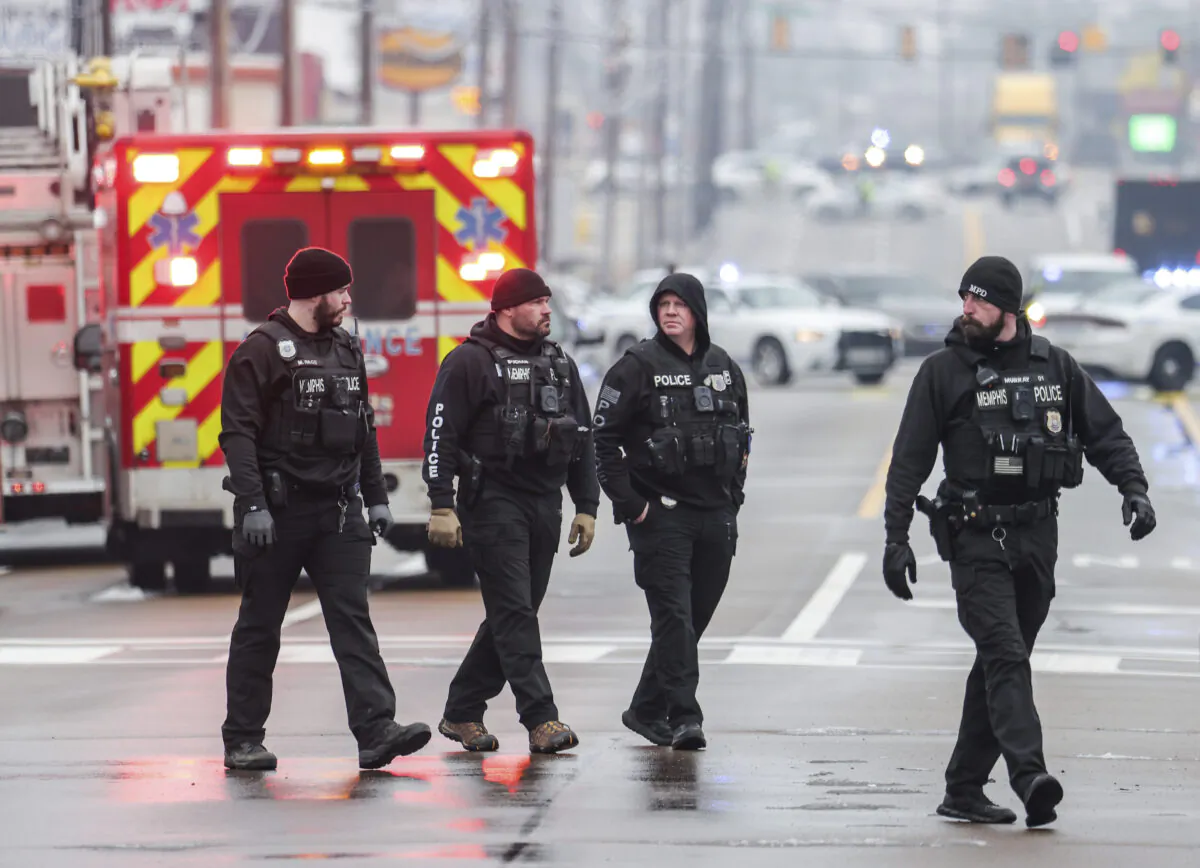 Law enforcement personnel work at the scene of a shooting at a Tennessee library in Memphis, Tenn., on Feb. 2, 2023. (Patrick Lantrip/Daily Memphian via AP)