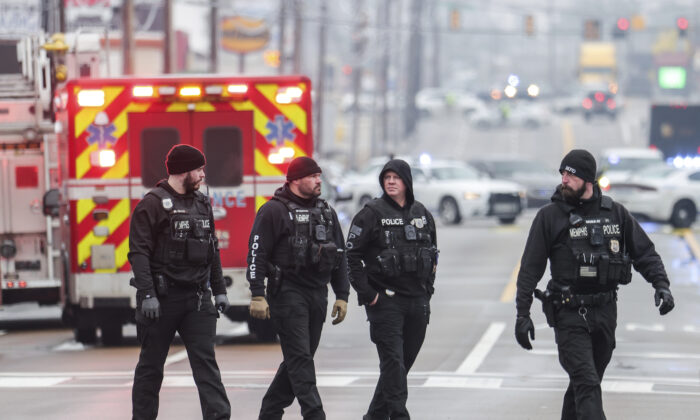 Law enforcement personnel work at the scene of a shooting at a Tennessee library in Memphis, Tenn., on Feb. 2, 2023. (Patrick Lantrip/Daily Memphian via AP)