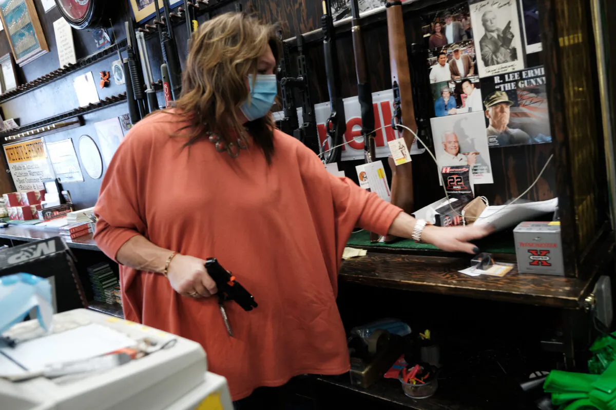 Lisa Caso sells guns at Caso's Gun-A-Rama store in Jersey City, N.J., on March 25, 2021. (Spencer Platt/Getty Images)