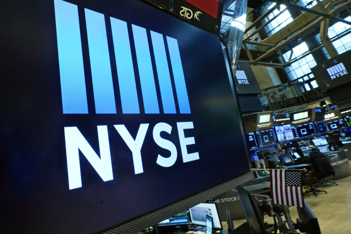 Logos the New York Stock Exchange adorn trading posts on the floor on March 16, 2022. (Richard Drew/AP Photo)