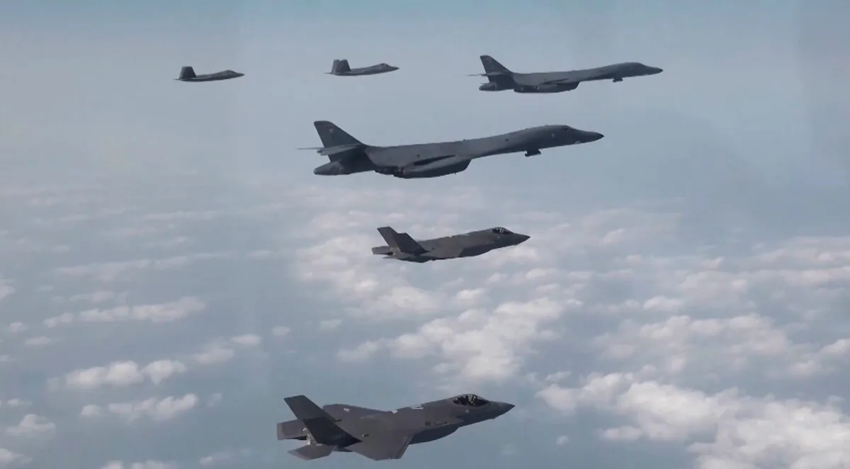 U.S. B-1B bombers, F-22 fighter jets, and F-35 fighter jets fly in air during joint drills between the United States and South Korea on Feb. 1, 2023, in a still from video. (South Korea's Defense Ministry Handout via Reuters/Screenshot via The Epoch Times)