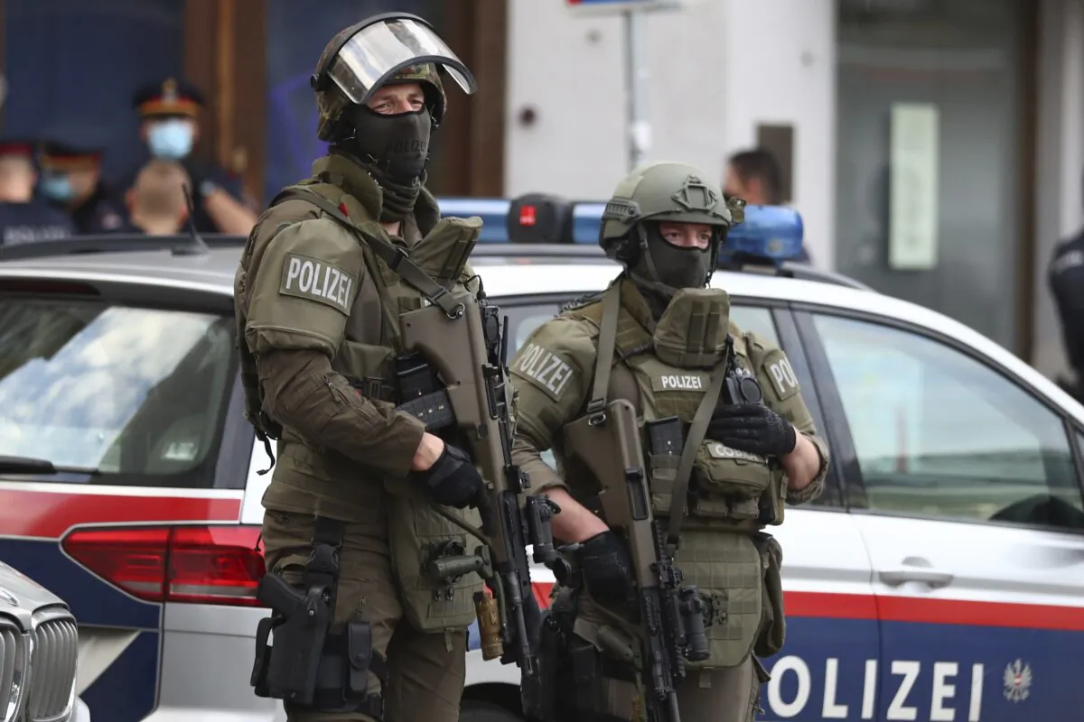 Police officers guard the scene of attack in Vienna on Nov. 3, 2020. (Matthias Schrader/AP Photo)