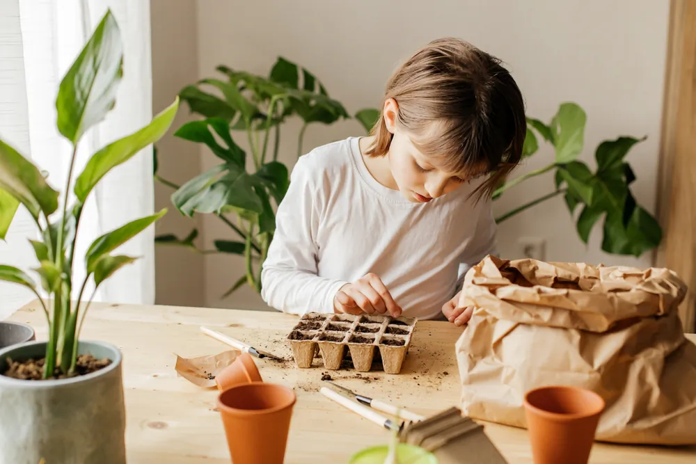 A home garden is a project the entire family can enjoy and take part in, while learning self-reliance skills. (Elena Medoks/Shutterstock)