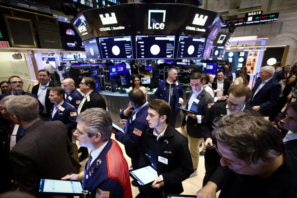 Traders work on the trading floor at the New York Stock Exchange (NYSE) in New York City on Jan. 27, 2023. (Andrew Kelly/Reuters)