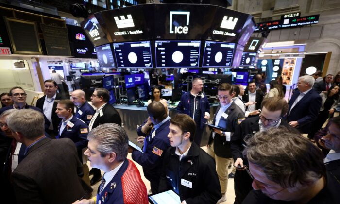 Traders work on the trading floor at the New York Stock Exchange (NYSE) in New York City on Jan. 27, 2023. (Andrew Kelly/Reuters)