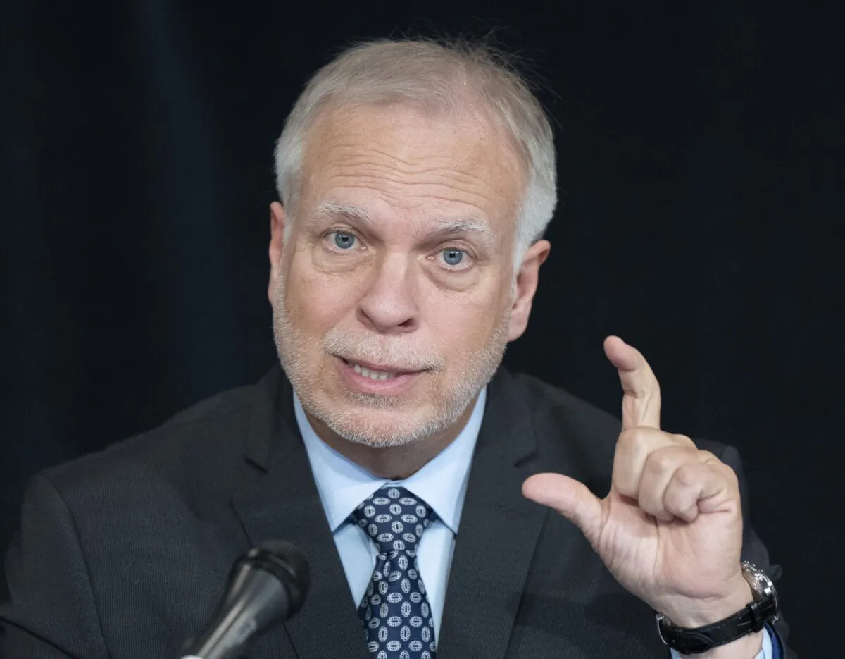 Quebec public health director Dr. Luc Boileau gestures during a news conference in Montreal on Feb. 2, 2023. (The Canadian Press/Ryan Remiorz)