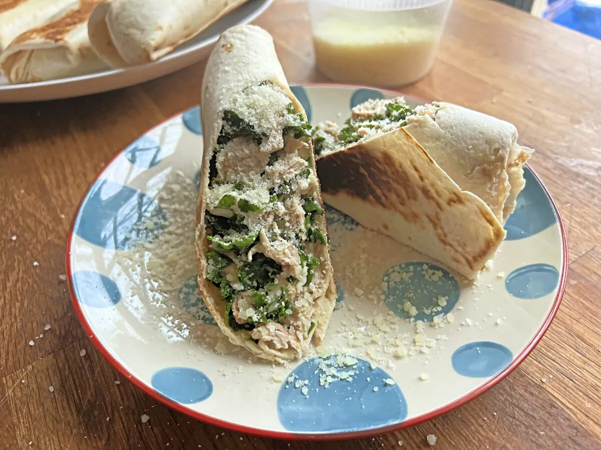 This Lemon Parmesan Chicken Wrap gets a healthy boost with chopped kale in a yogurt dressing. (Gretchen McKay/Pittsburgh Post-Gazette/TNS)