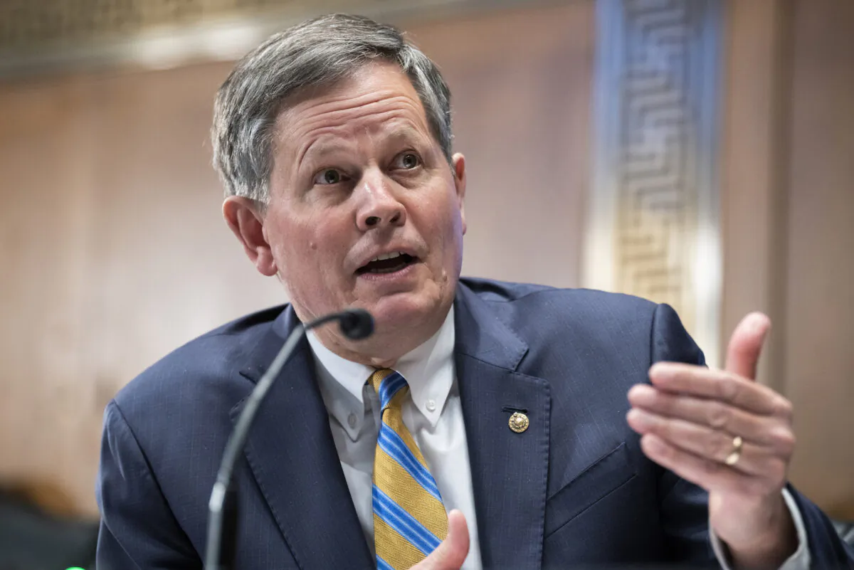 Sen. Steve Daines (R-Mont.) questions U.S. Federal Reserve Chair Jerome Powell as he testifies at a Senate Banking, Housing, and Urban Affairs Committee hearing on Capitol Hill in Washington on March 3, 2022. (Tom Williams-Pool/Getty Images)